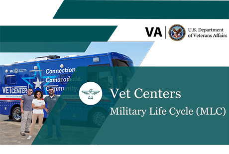 Employees stand in front of a Vet Center van 